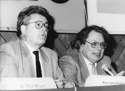 "Hans-Jörg Federer, Direktor Metall-Union" - Portraitbild an Konferenz, links, vermutlich 1991